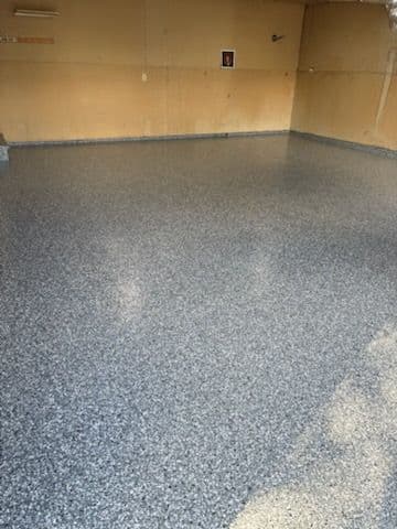 Project From Cracks to Epoxy Brilliance in the Garage image