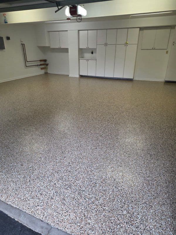 Stunning Garage Floor Revamp with Flaked Epoxy image