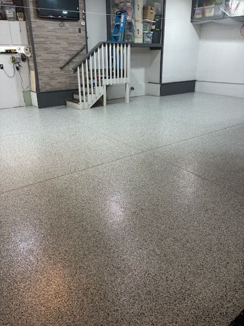 Stunning Garage Transformation with Flaked Epoxy image